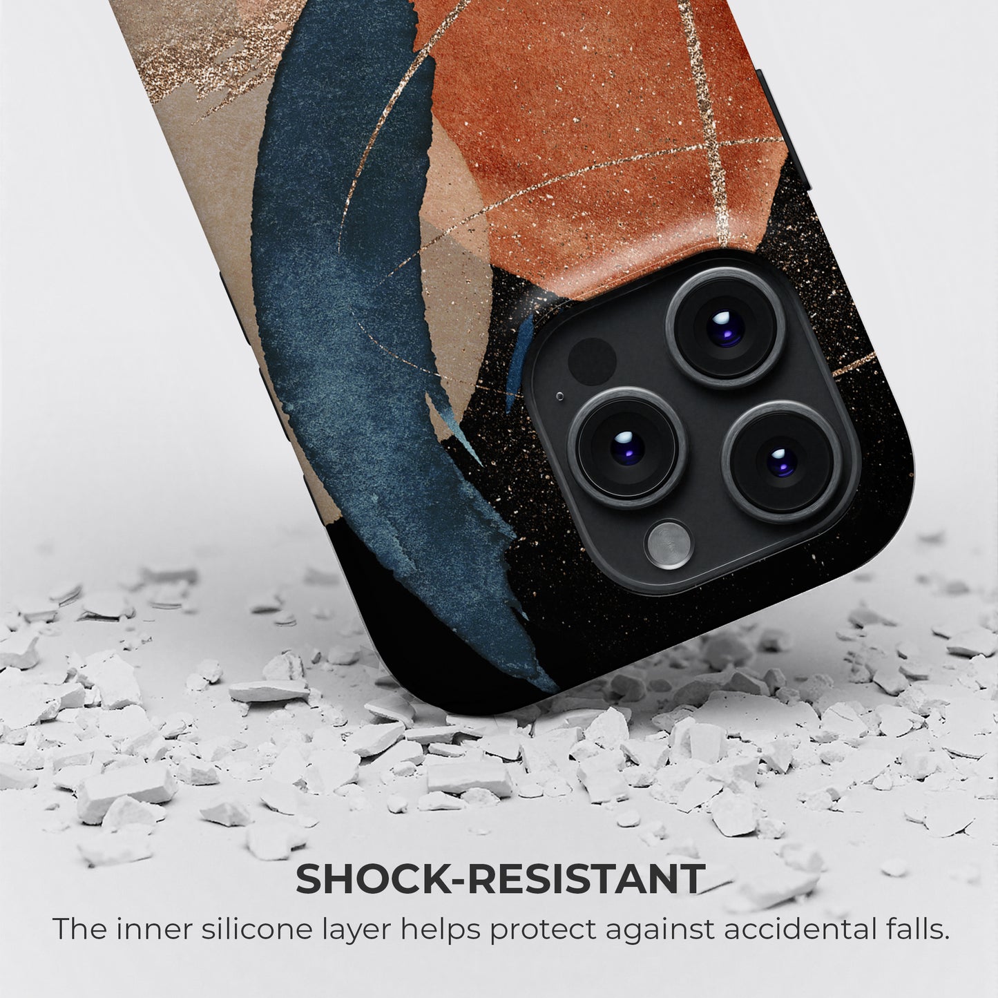 Abstract terracotta and navy blue tough phone case with shock-resistant silicone layer providing strong drop protection against accidental falls