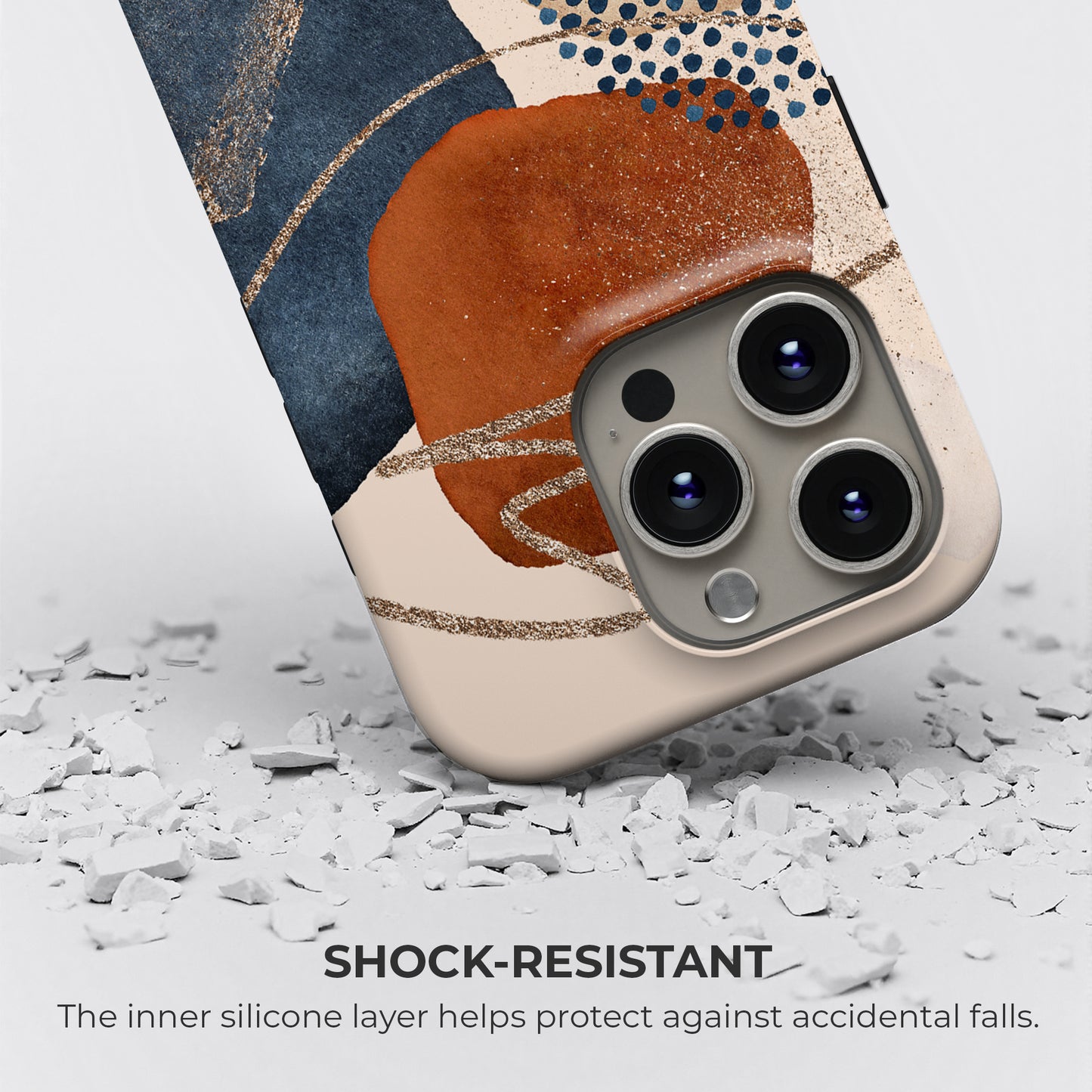 Abstract terracotta and navy blue tough phone case with shock-resistant silicone layer providing advanced drop protection against accidental falls