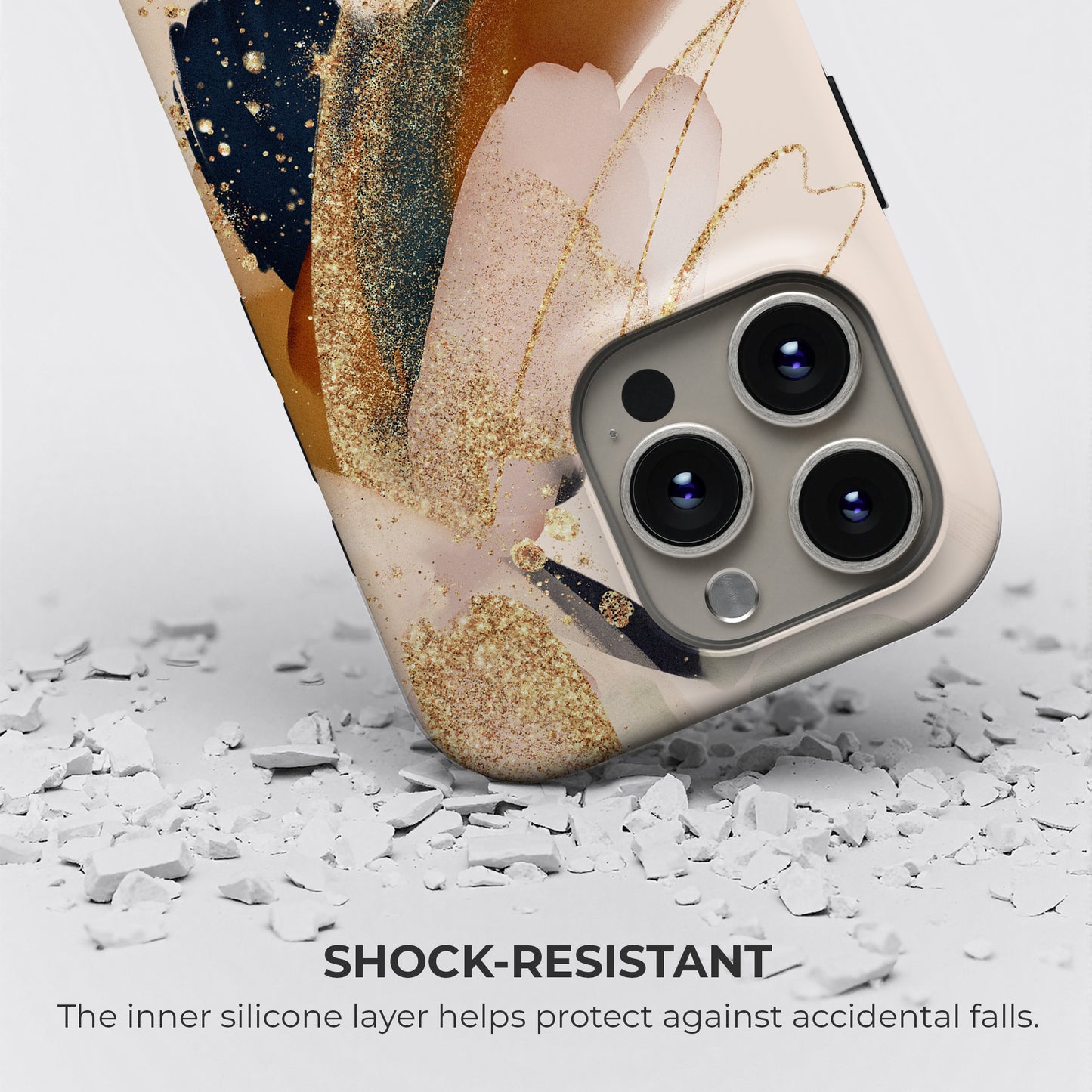 Beige and gold abstract brush tough phone case showing shock-resistant design with inner silicone layer for drop protection