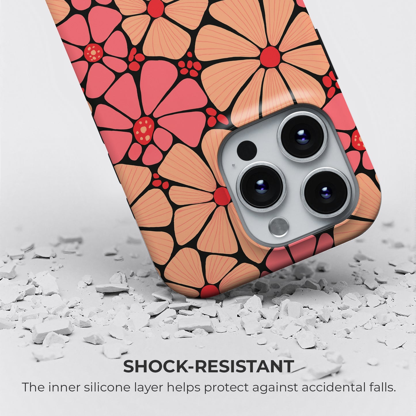 Coral and peach floral phone case with black mosaic outlines, tough shock-resistant design featuring silicone inner layer for drop protection by Casiden