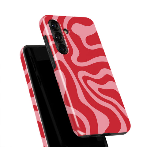 a smartphone case with a vibrant red and pink wavy pattern.