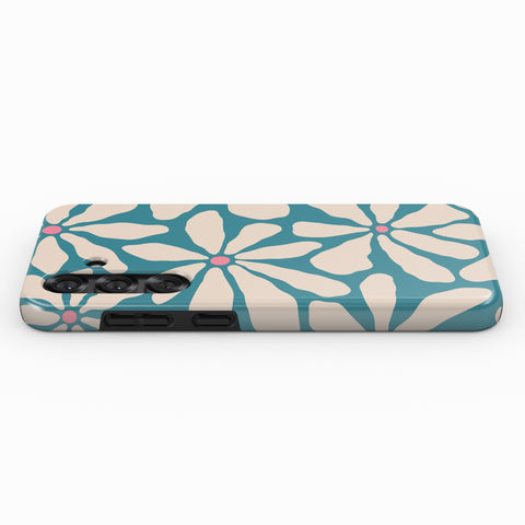 A phone case with a floral pattern in shades of blue and white.