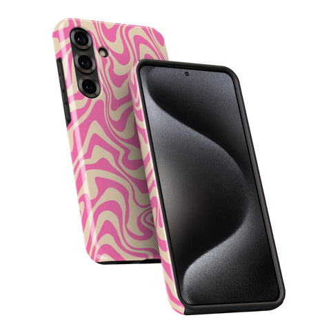 a smartphone with a pink and white striped case on it.
