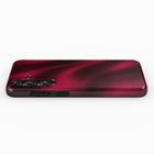 A red-colored smartphone case with a wavy texture, placed on a white background.