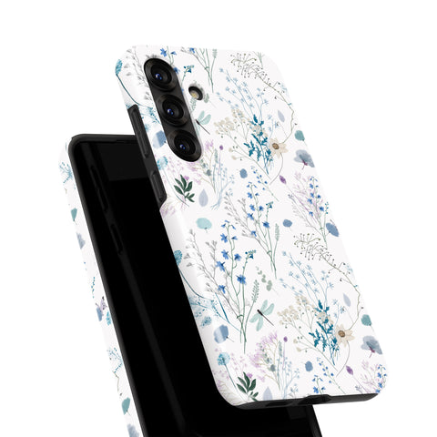 a white phone case with a floral pattern on it.