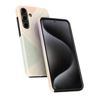 a smartphone with a black and white design on its case, and the phone is positioned facing upwards.