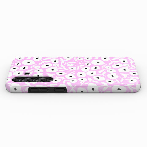 A pink and white floral pattern on a phone case.