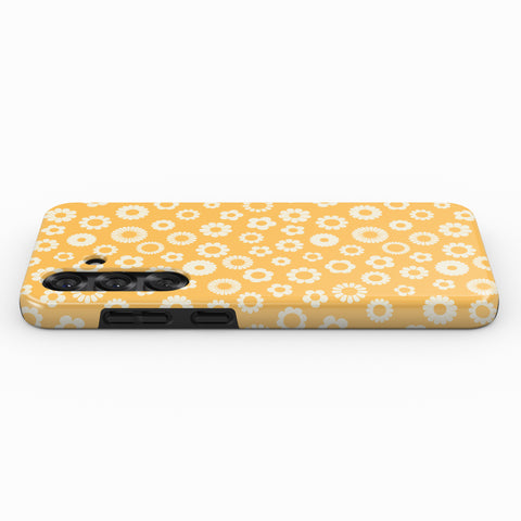 A yellow phone case with a repeating pattern of white flowers on a white background.