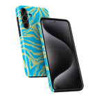 a smartphone with a vibrant, zebra-patterned case. The case is predominantly blue and yellow, with a black background. The phone is positioned in such a way that it is facing the camera, showcasing the colorful case.