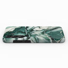 a marble-like pattern on a surface, with a green and white color scheme.