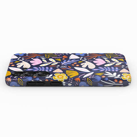 a colorful, patterned phone case with a variety of flowers and leaves in different colors, including blue, pink, yellow, and orange.