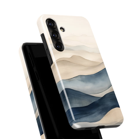 a phone case with a watercolor-style design depicting a landscape with mountains and water.