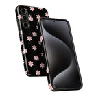 a black smartphone case with a floral pattern on it.