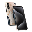 a smartphone case with a unique abstract design, including a combination of pink, blue, and white colors. The case appears to be made of a material that resembles a wavy pattern, giving it a distinctive and eye-catching appearance.