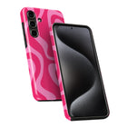 a pink and black smartphone case with a wavy pattern.