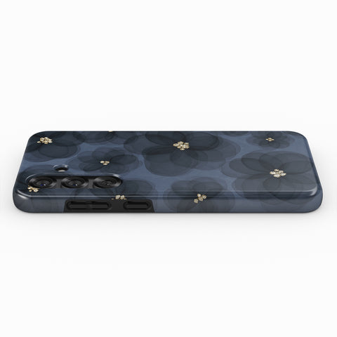 A black phone case with a floral pattern on it.
