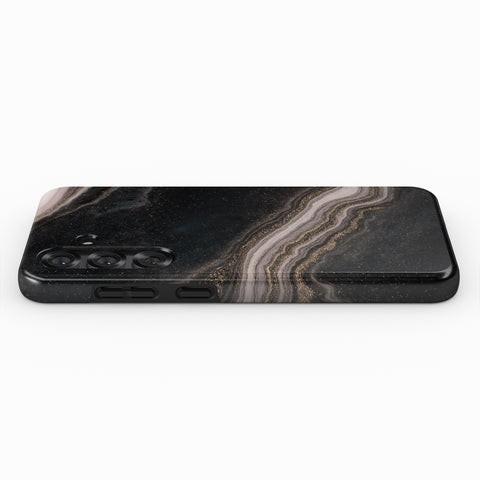 a smartphone case with a marble-like pattern on its surface.