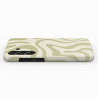 A phone case with a wavy pattern in shades of green and beige.