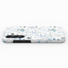 a white phone case with a floral pattern on it.