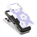 a phone case with a purple and white flower pattern.