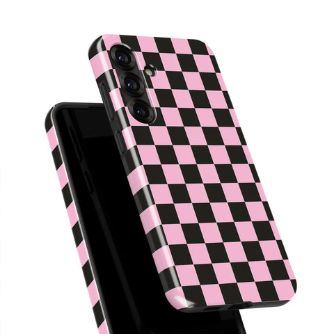 a phone case with a pink and black checkered pattern.