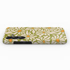 a phone case with a floral pattern in shades of green and orange.