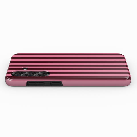 A pink and black striped phone case is shown against a white background.