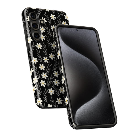 a smartphone with a black floral pattern on its back cover and a black screen.