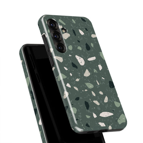 a phone case with a green and white speckled pattern.