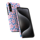 a smartphone case with a floral pattern in pink and blue colors. The case is designed to protect and showcase the phone's screen.