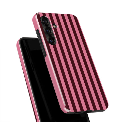 A pink and black striped phone case is shown against a white background.