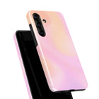 A pink and black smartphone case is shown against a white background.