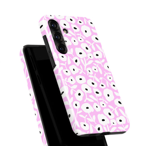 a pink and white floral pattern on a phone case.