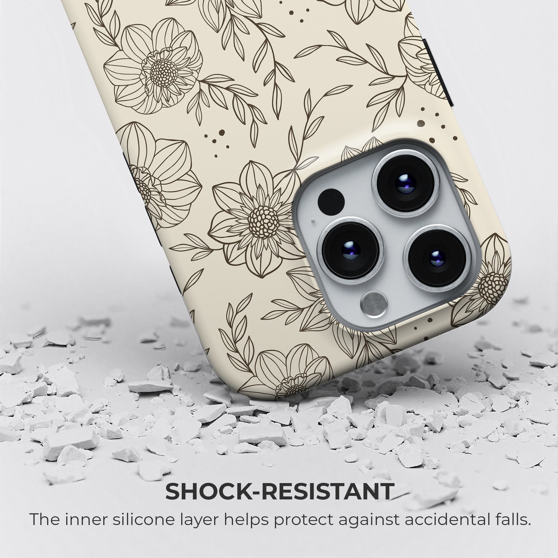 Beige floral line art phone case with shock-resistant silicone liner protecting against accidental drops and falls