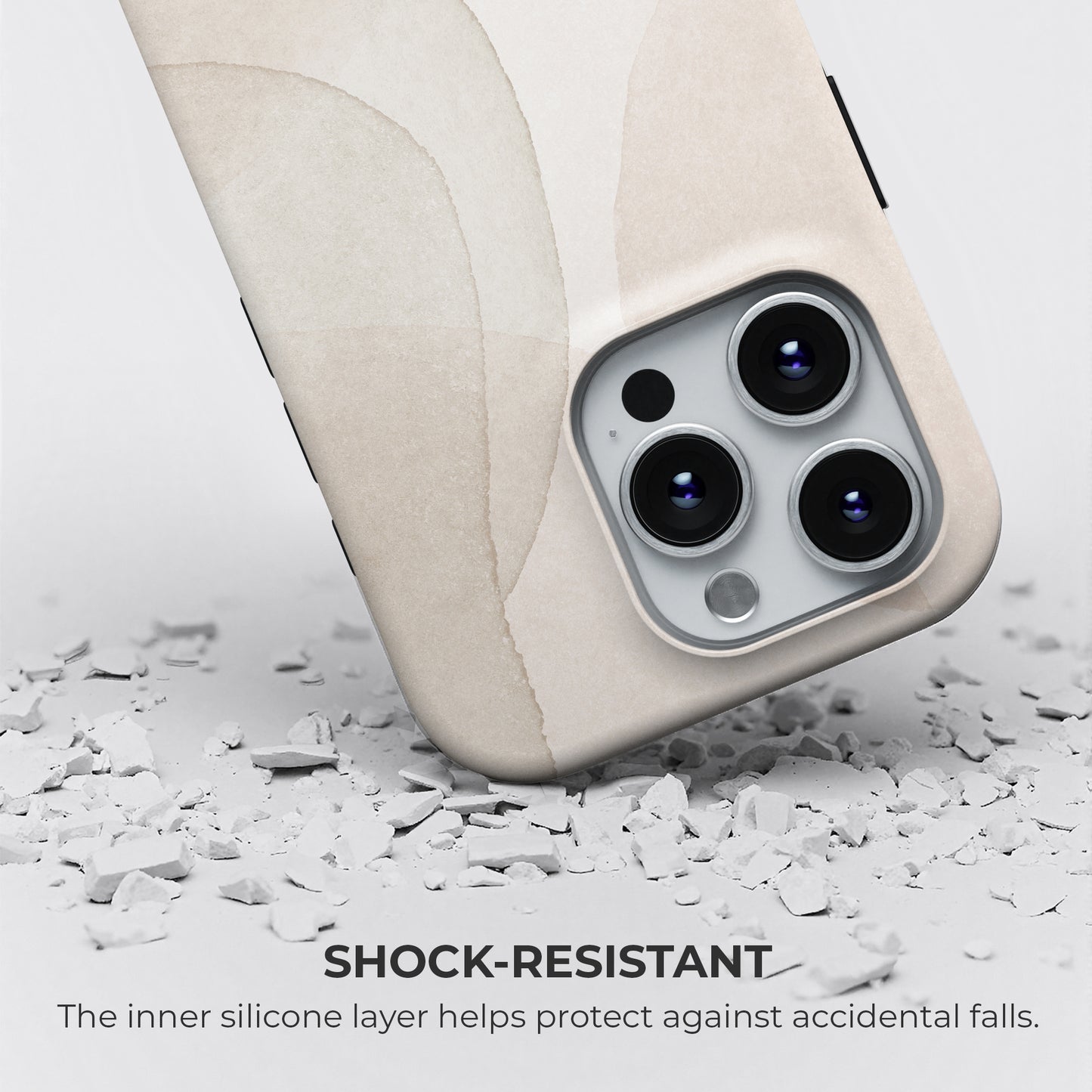 Beige minimalist abstract tough phone case showing shock-resistant design with silicone inner layer protecting against drops and falls
