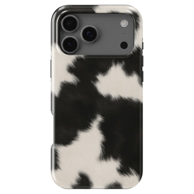 Black and white cow print phone case by Casiden featuring a soft fur-inspired animal pattern with a stylish aesthetic