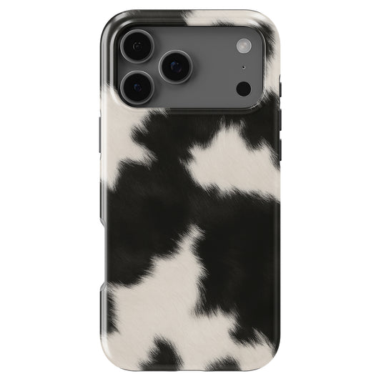 Black and white cow print phone case by Casiden featuring a soft fur-inspired animal pattern with a stylish aesthetic
