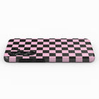 A pink and black checkered pattern on a phone case.