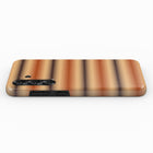 a rectangular phone case with a striped pattern in shades of brown and orange.