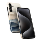 a smartphone case with a unique, abstract design that resembles a wave or a pattern. The case appears to be made of a material that has a textured, black-and-white appearance.