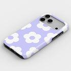 A purple and white phone case with a flower pattern on it.