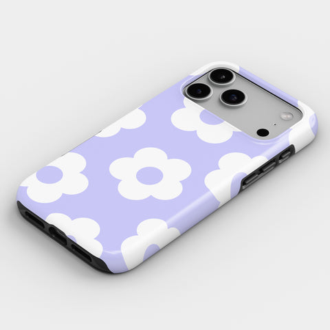 A purple and white phone case with a flower pattern on it.