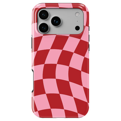 Pink and red checker phone case by Casiden featuring a retro wavy checkered pattern with glossy finish and bold aesthetic