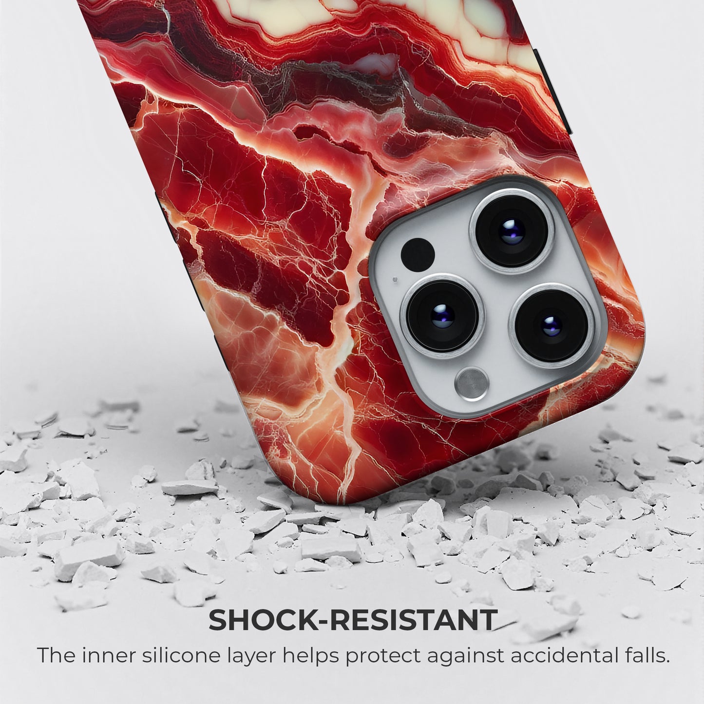 Red marble tough phone case showing shock-resistant design with silicone liner for drop protection