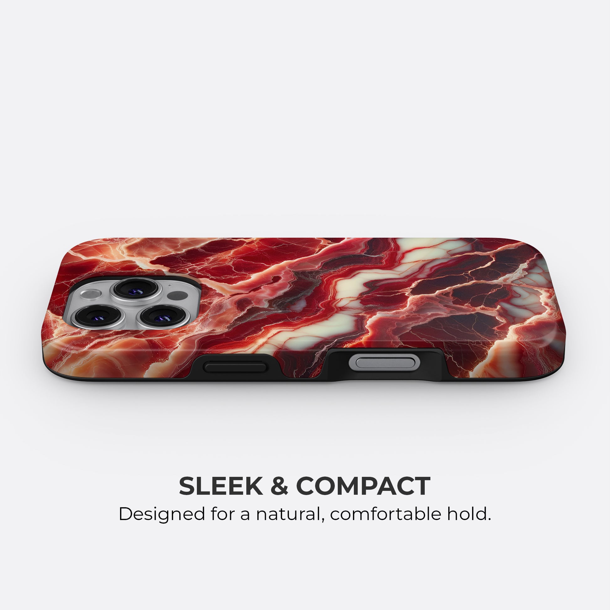 Red marble tough phone case with sleek and compact design, showing slim profile and comfortable hold